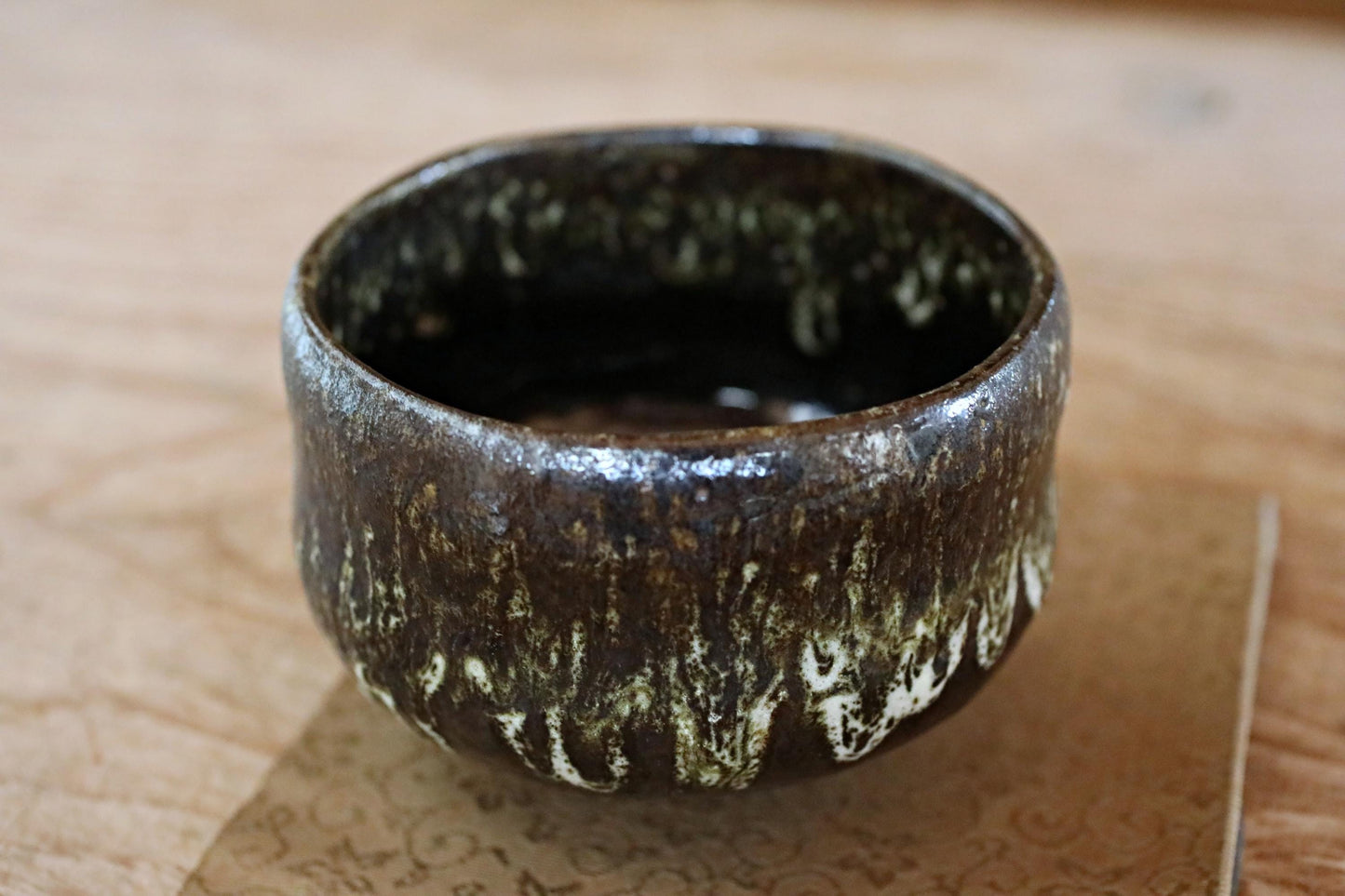Japanese Raku Tea Bowl – Hand-Sculpted Chawan with Black Green Glaze | Ohi Kiln