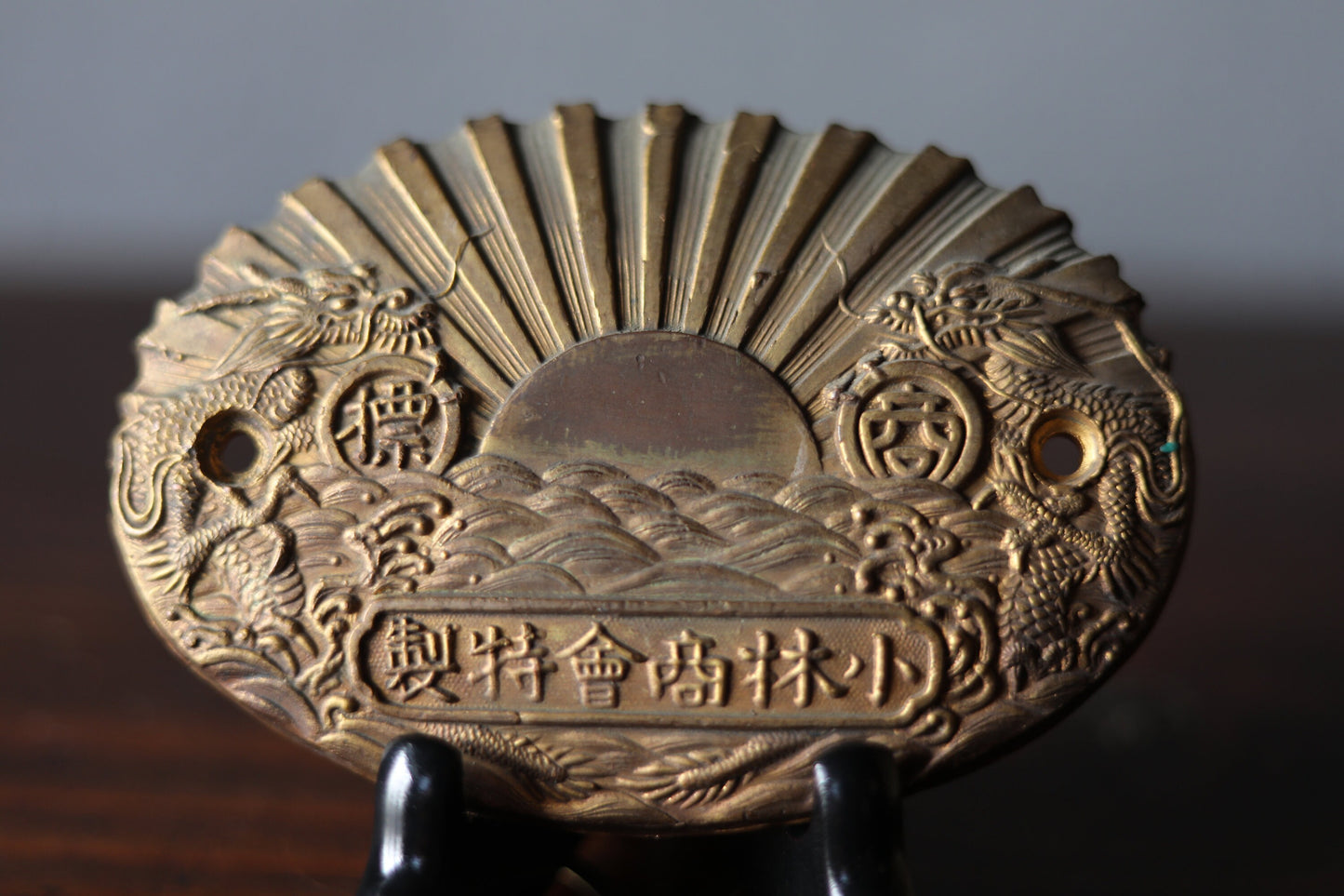 Japanese vintage metal plate for a safety box with relieves of sunrising on the sea, dragons and company name, H3.8xW5.5in