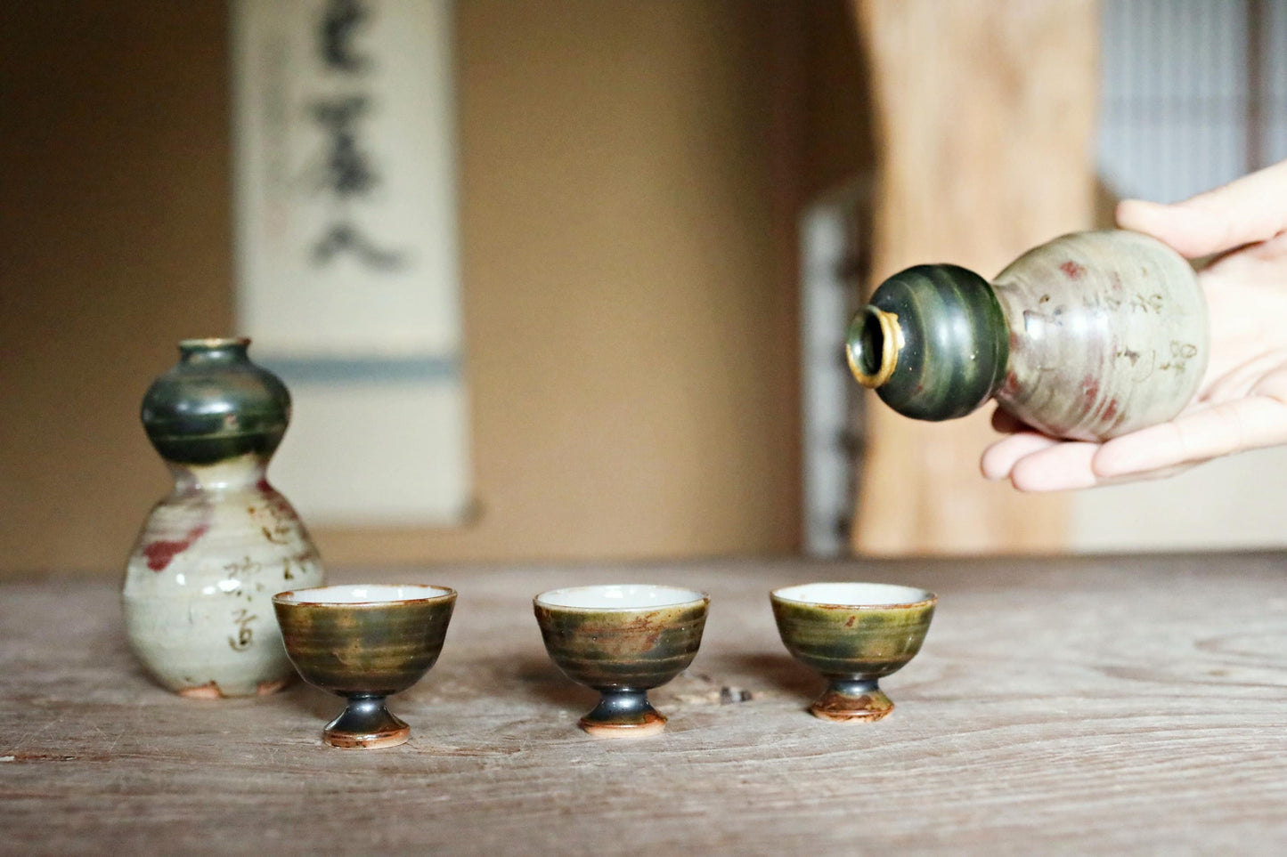 A pair of Kintsugi Tokkuri bottles and cups, Japanese antique porcelain sake bottle and cups with old words in Kanji H3.9in/10cm