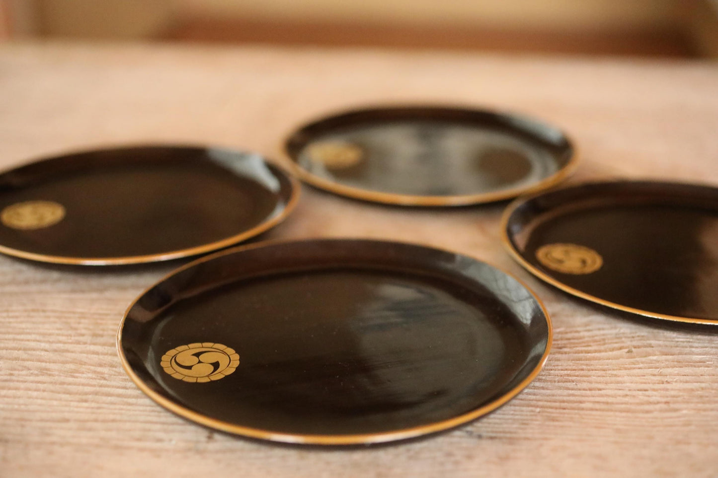 Antique Urushi Plates - Japanese Lacquerware Set of 4 with Gold Rim & Mitsu Tomoe Crest