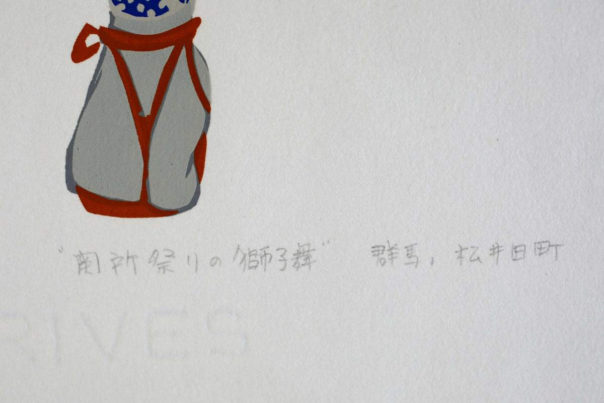 a gray backpack with a red and blue design, and there is some text written in Chinese characters below it.