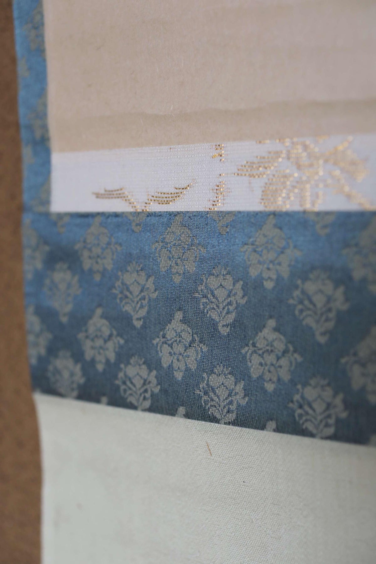 a close-up view of a fabric with a floral pattern, showcasing the intricate design and texture of the material.