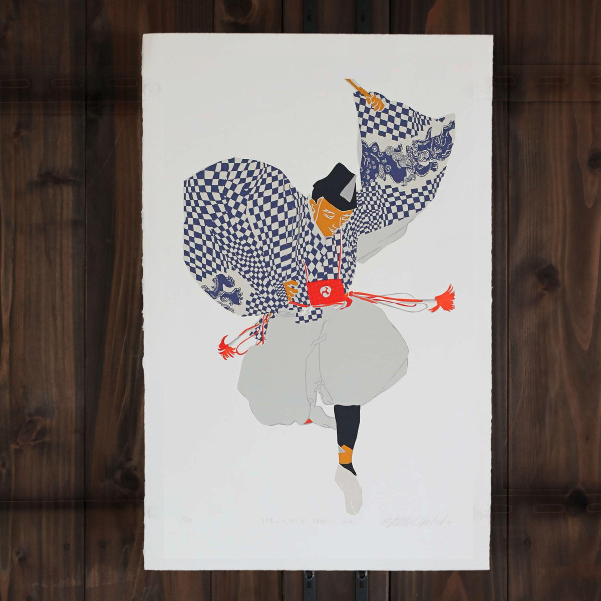 A stylized illustration of a person in traditional Japanese attire, with a checkered pattern and a red and white outfit, is depicted in the image.