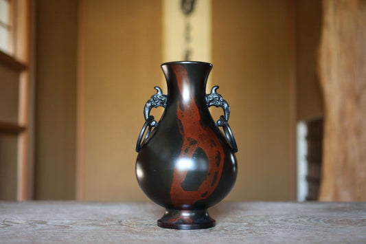 vintage bronze vase black red marble