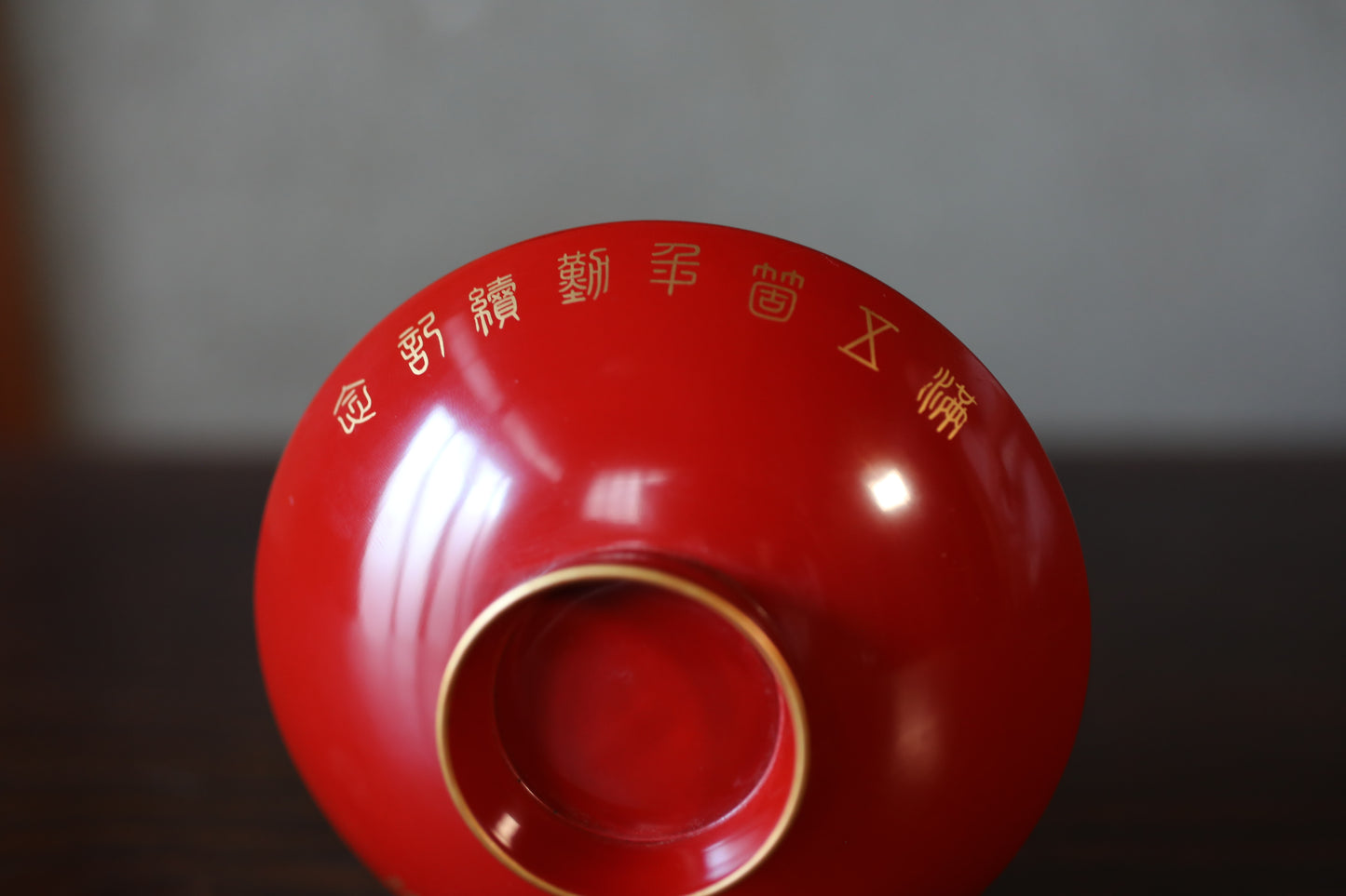 Red lacquer wooden sake cup with calligraphy and signature in gold, Japanese antique wooden urushi 1920s "SAKAZUKI" with box, 4.3in/10.8cm