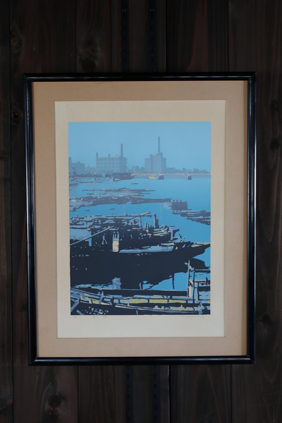 The image is a framed painting depicting a serene harbor scene with boats and buildings in the background.