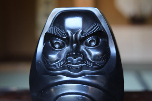 Daruma Black Stone Figurine – Japanese Vintage Doll with Glaring Expression Decor