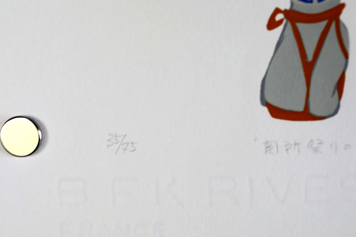 a small illustration of a person wearing a red and gray outfit, with a small circular object next to it.