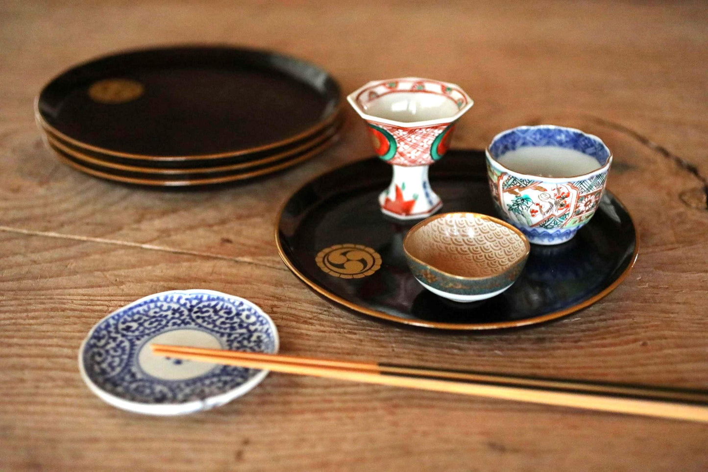 Antique Urushi Plates - Japanese Lacquerware Set of 4 with Gold Rim & Mitsu Tomoe Crest