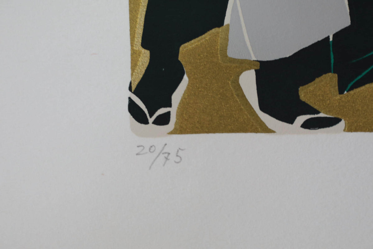 The image is a close-up of a printed piece of paper with a signature and a number.