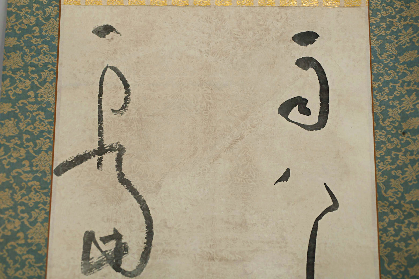 a single, abstract character or symbol, which is not accompanied by any additional text.