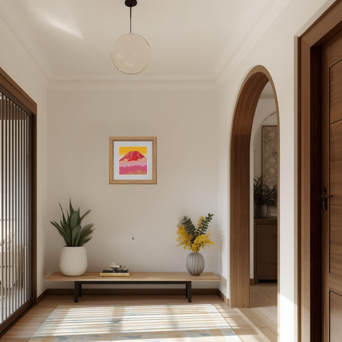 a well-lit and organized entryway with a wooden bench, a potted plant, and a framed artwork on the wall.