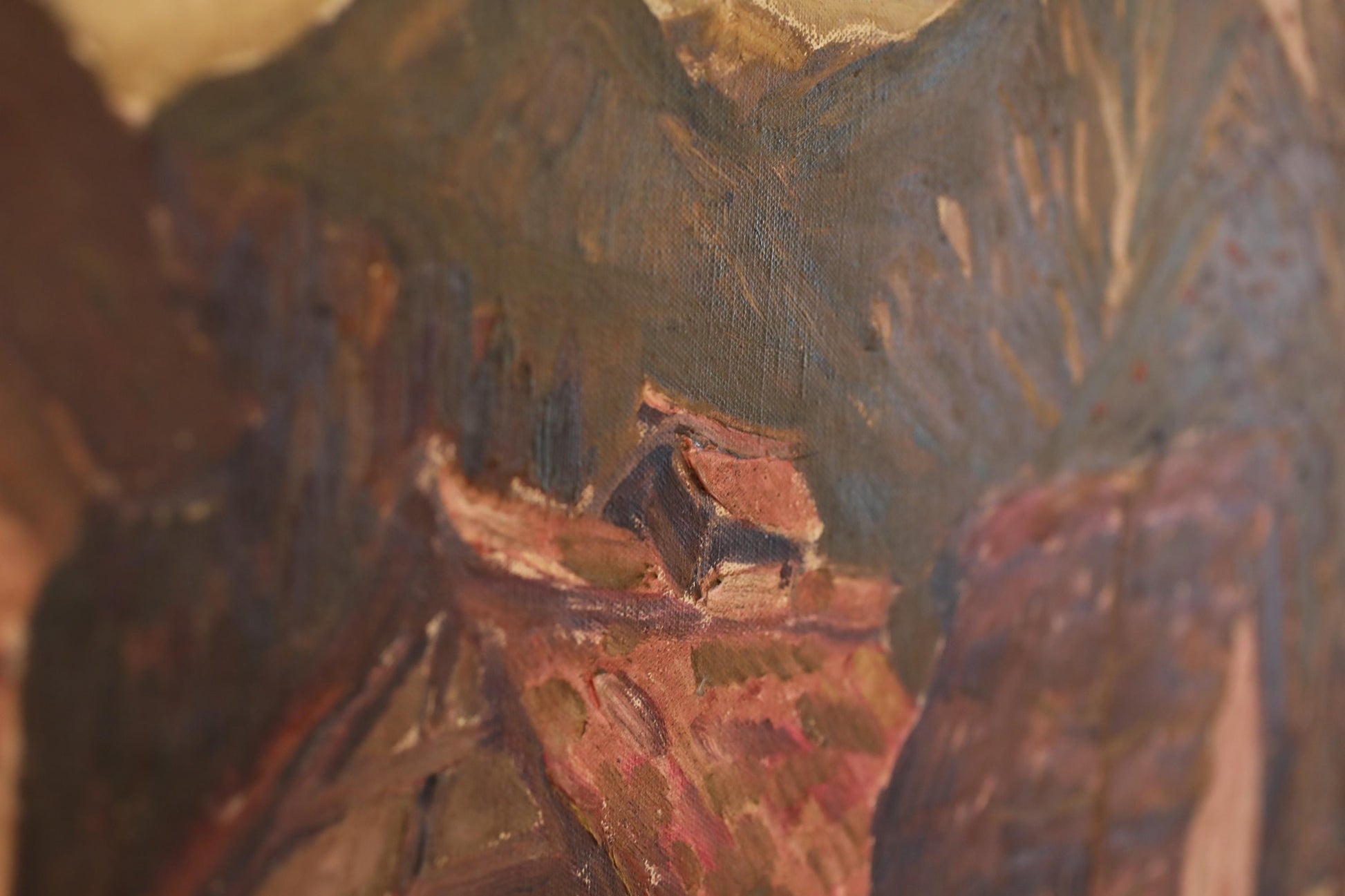 The image is a close-up of a painting featuring a landscape with mountains and a small animal, possibly a bird or a deer, in the foreground.