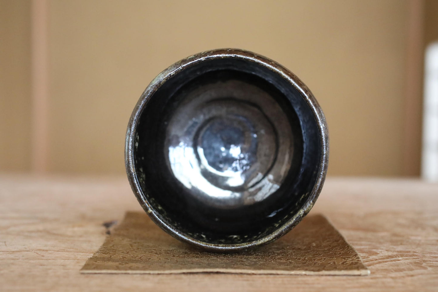Japanese Raku Tea Bowl – Hand-Sculpted Chawan with Black Green Glaze | Ohi Kiln