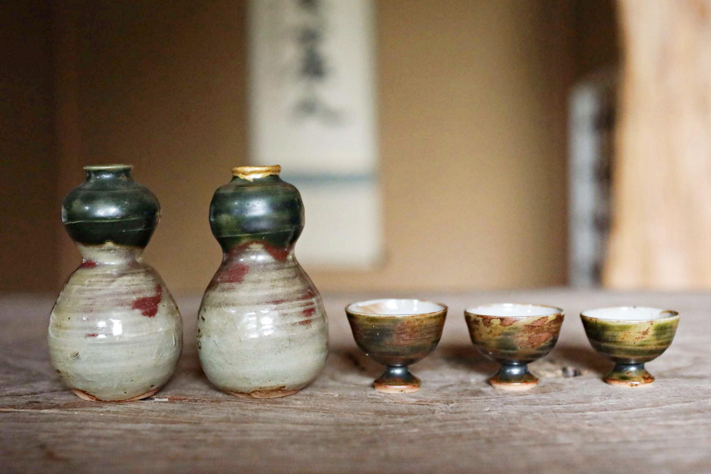 A pair of Kintsugi Tokkuri bottles and cups, Japanese antique porcelain sake bottle and cups with old words in Kanji  H3.9in/10cm